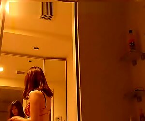 Japanese girl enjoys shower